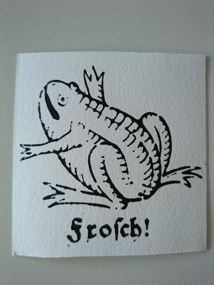 black and white parchment print of a frog standing on its hind legs, raising its arms into the air and looking funny. Below the German letters "Frosch!" (frog) in Schabacher font.
