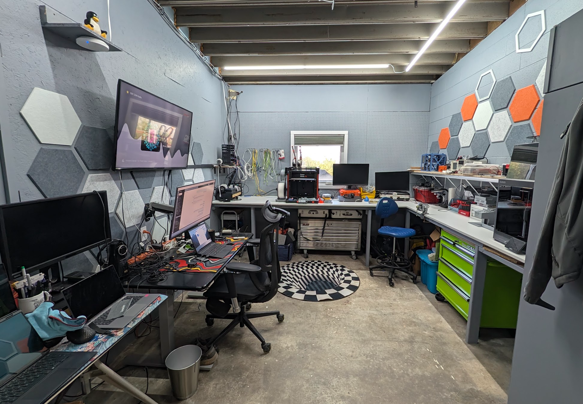 Geeky home office, computers, 3d printers and tool chests.