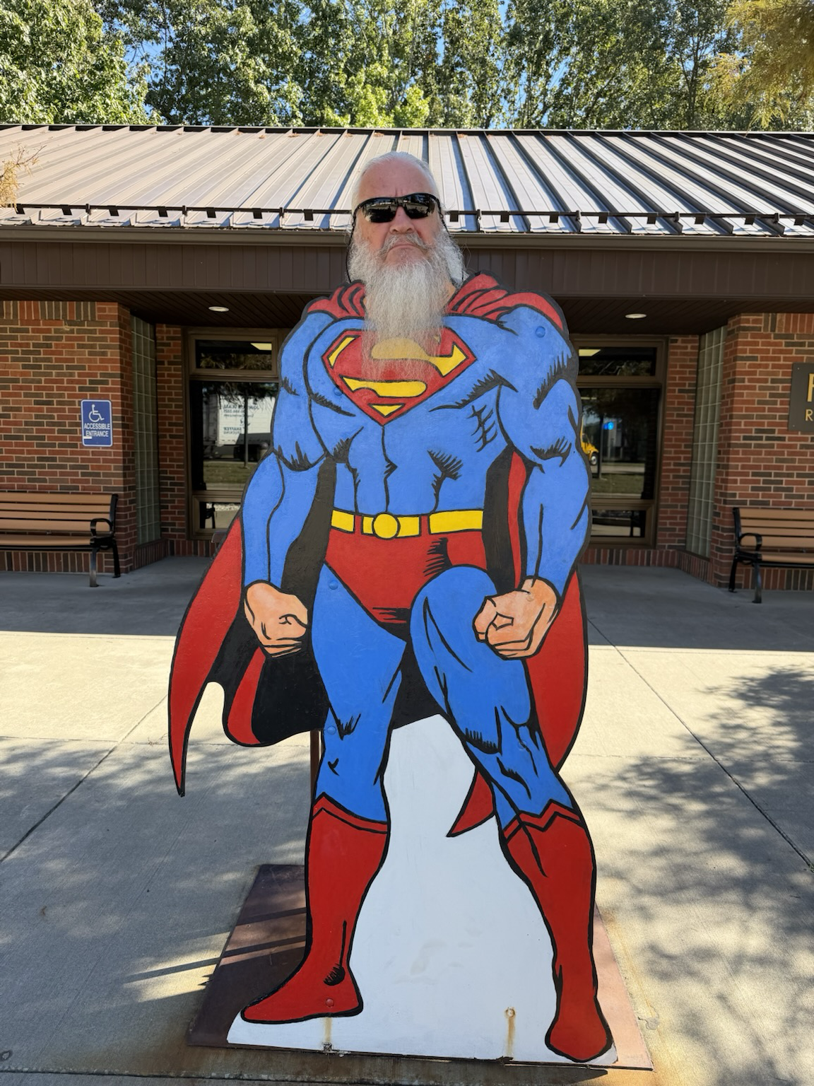 Superman with a long, gray beard.