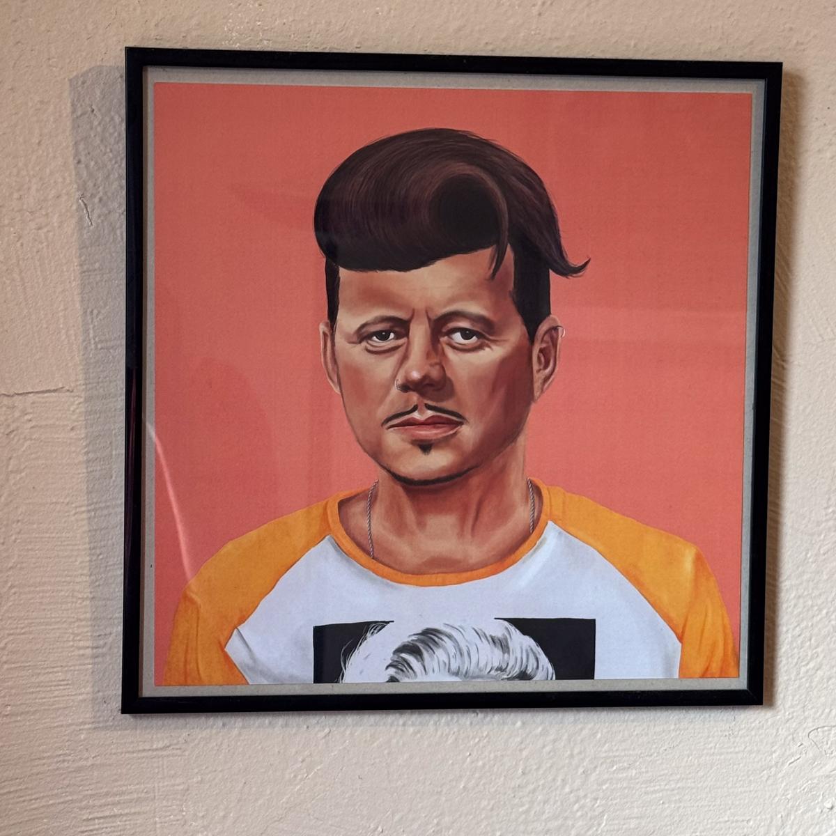 A portrait of John F. Kennedy reimagined as a hipster, part of the HIPSTORY series created by artist Amit Shimoni.